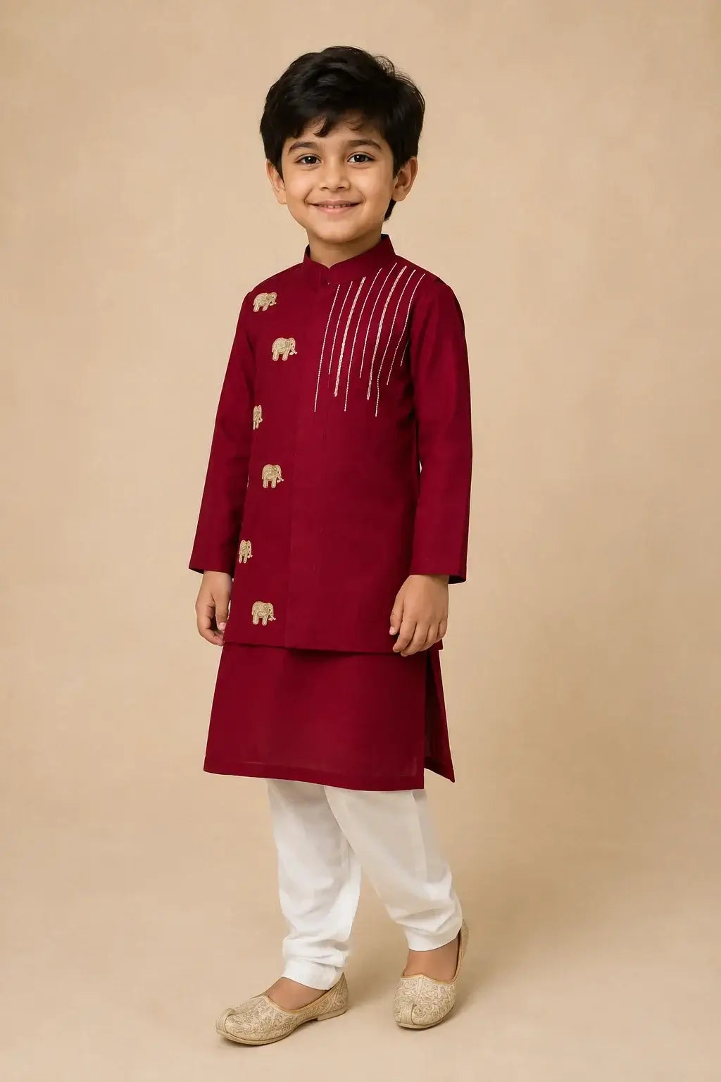 Boys maroon elephant embroidered kurta pajama set with gold detailing and white pajama – festive Indian ethnic wear