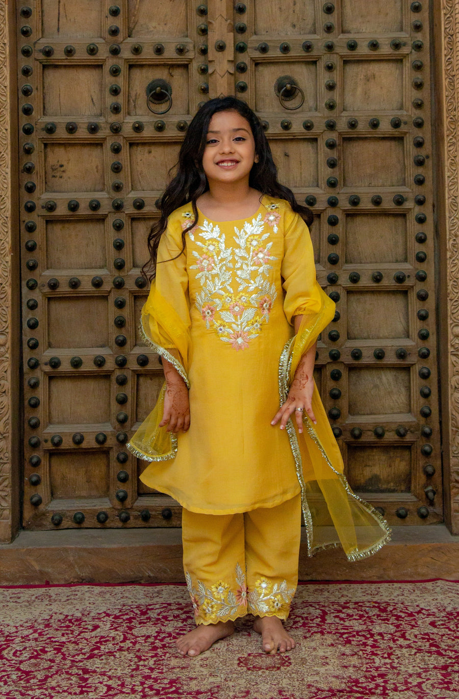 Yellow Gotta Patti Sharara Set by Marwar Roots featuring traditional embroidery and flared pants for festive wear.