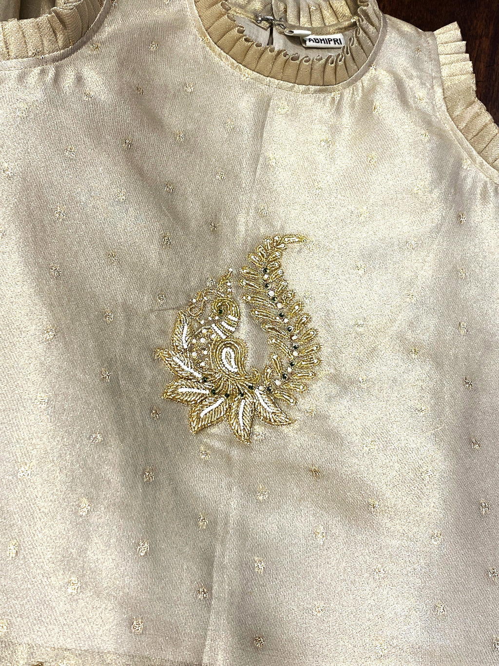 Ivory gold embroidered Indo-Western sharara set for girls with ruffle top and flared pants