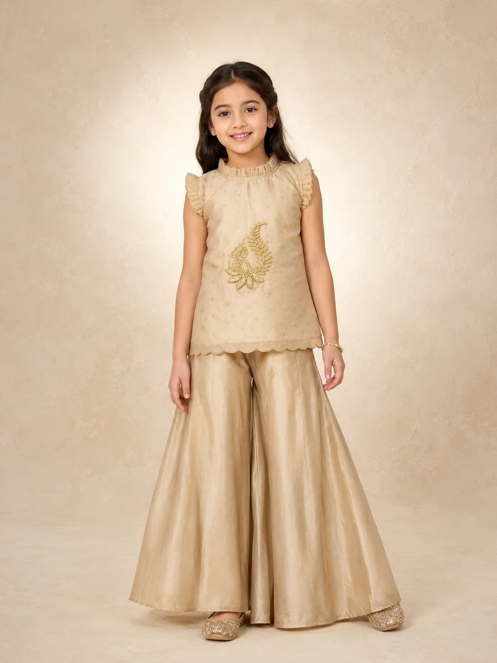 Ivory gold embroidered Indo-Western sharara set for girls with ruffle top and flared pants