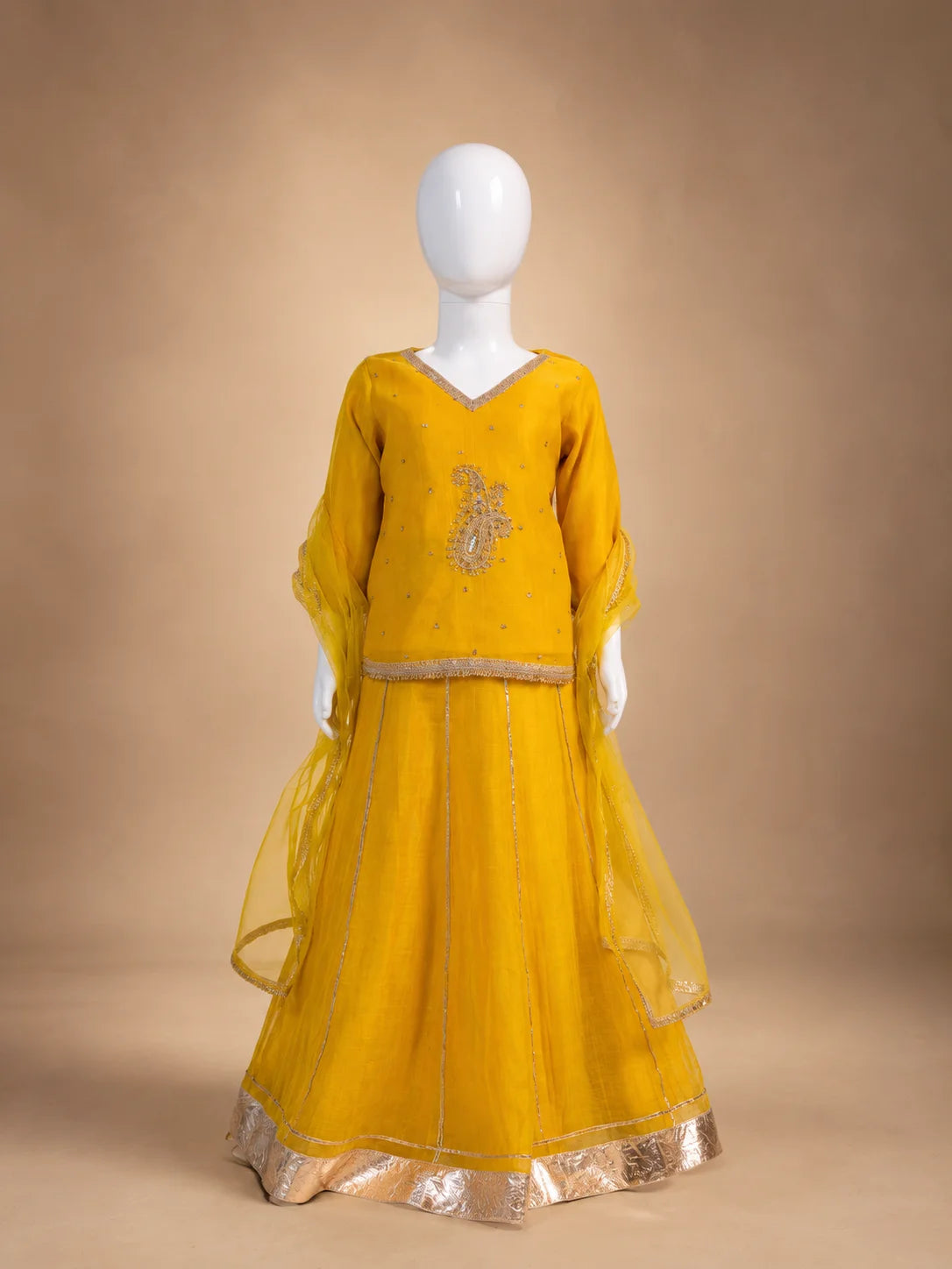 Yellow embroidered girls lehenga set with dupatta and flared skirt