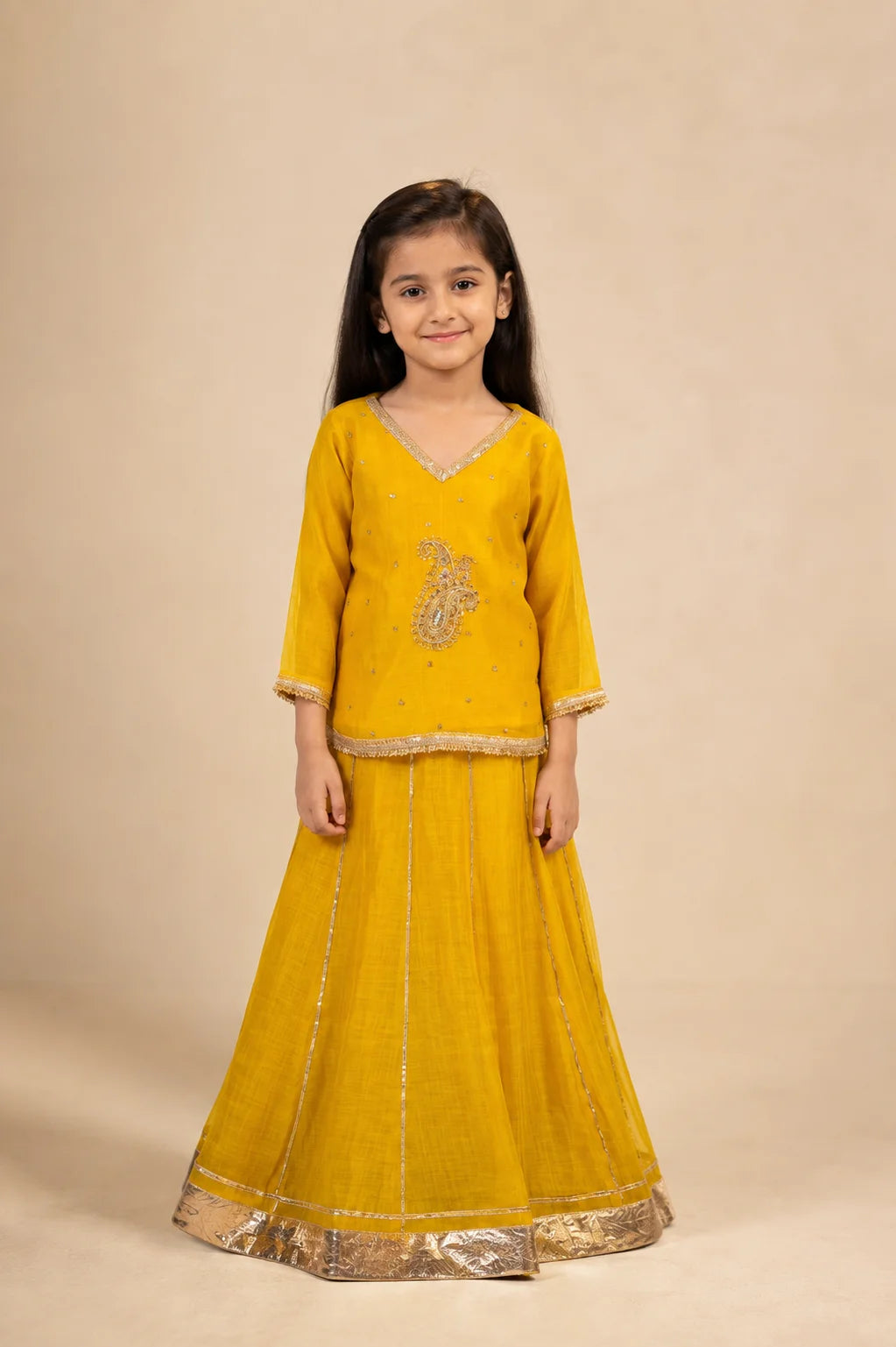 Yellow embroidered girls lehenga set with dupatta and flared skirt