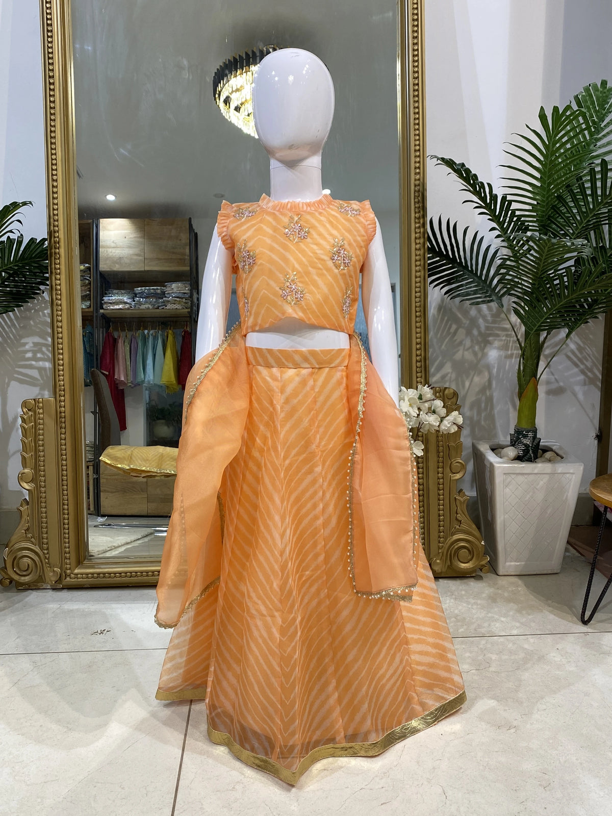 Narangi orange embroidered lehenga set for girls with striped flared skirt and sheer dupatta
