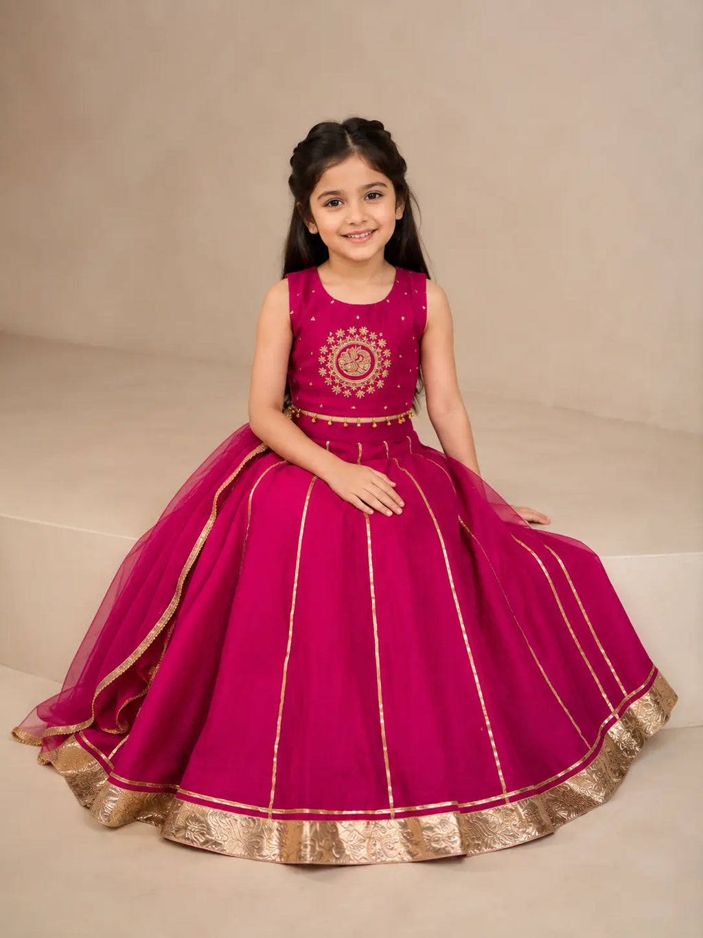 Rani pink embroidered girls lehenga set with dupatta and gold detailing