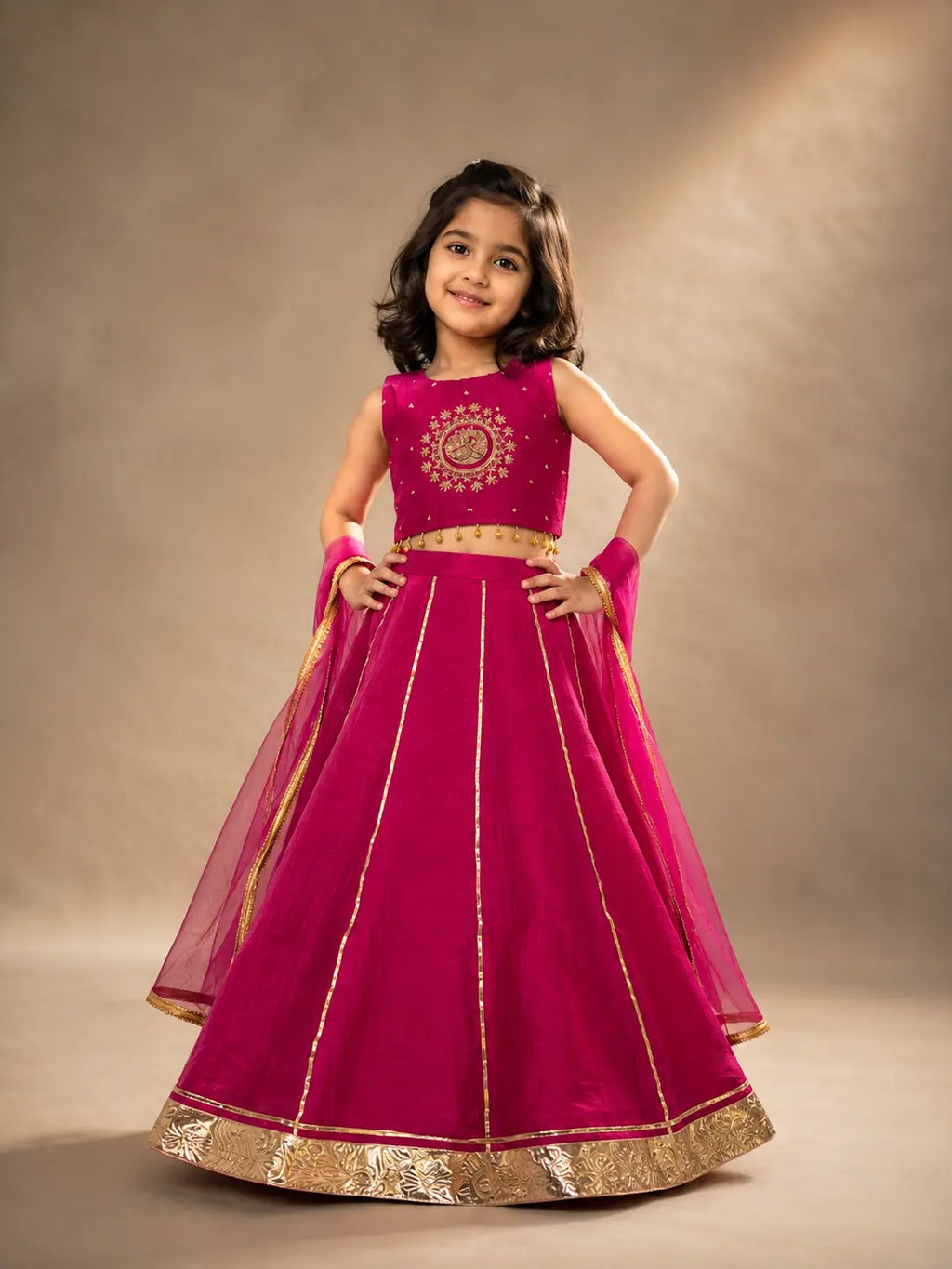 Rani pink embroidered girls lehenga set with dupatta and gold detailing
